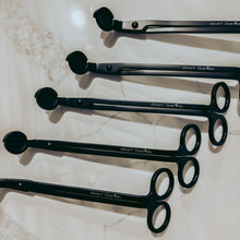 Load image into Gallery viewer, Set of black wick trimmers on a marble surface