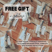 Load image into Gallery viewer, Palo Santo smudging sticks in clear packaging on a wooden surface with promotional text overlay.
